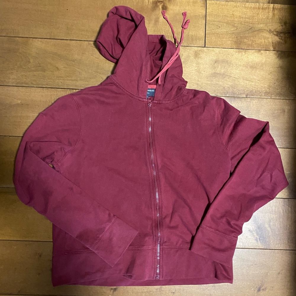 Lost sleeve vest with a hoodie
